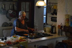 Ria is cooking paella