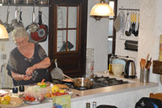 Ria is cooking paella