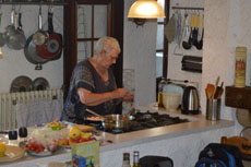 Ria is cooking paella